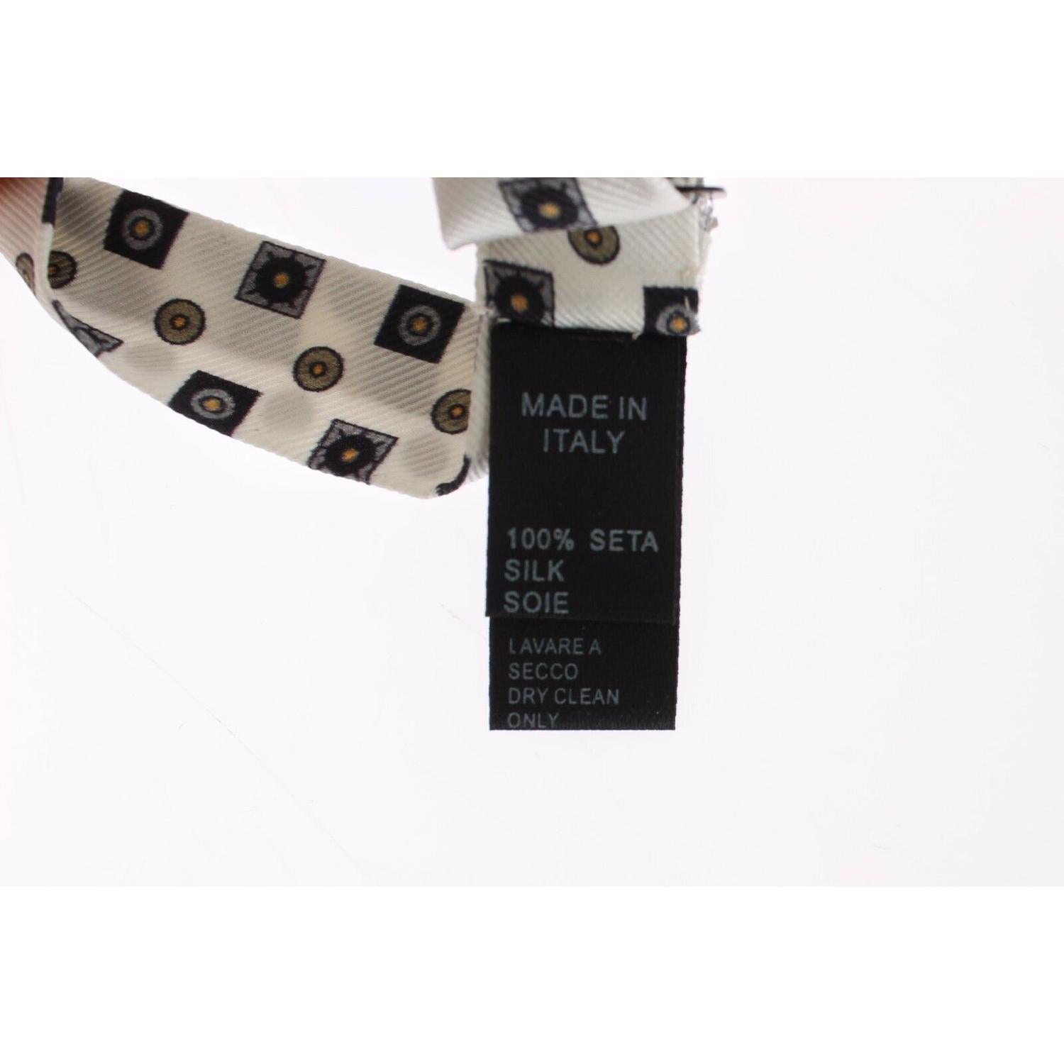 طقم ربطة عنق من الحرير وحزام من الجلد بتصميم باروكي أنيق من دولتشي آند غابانا