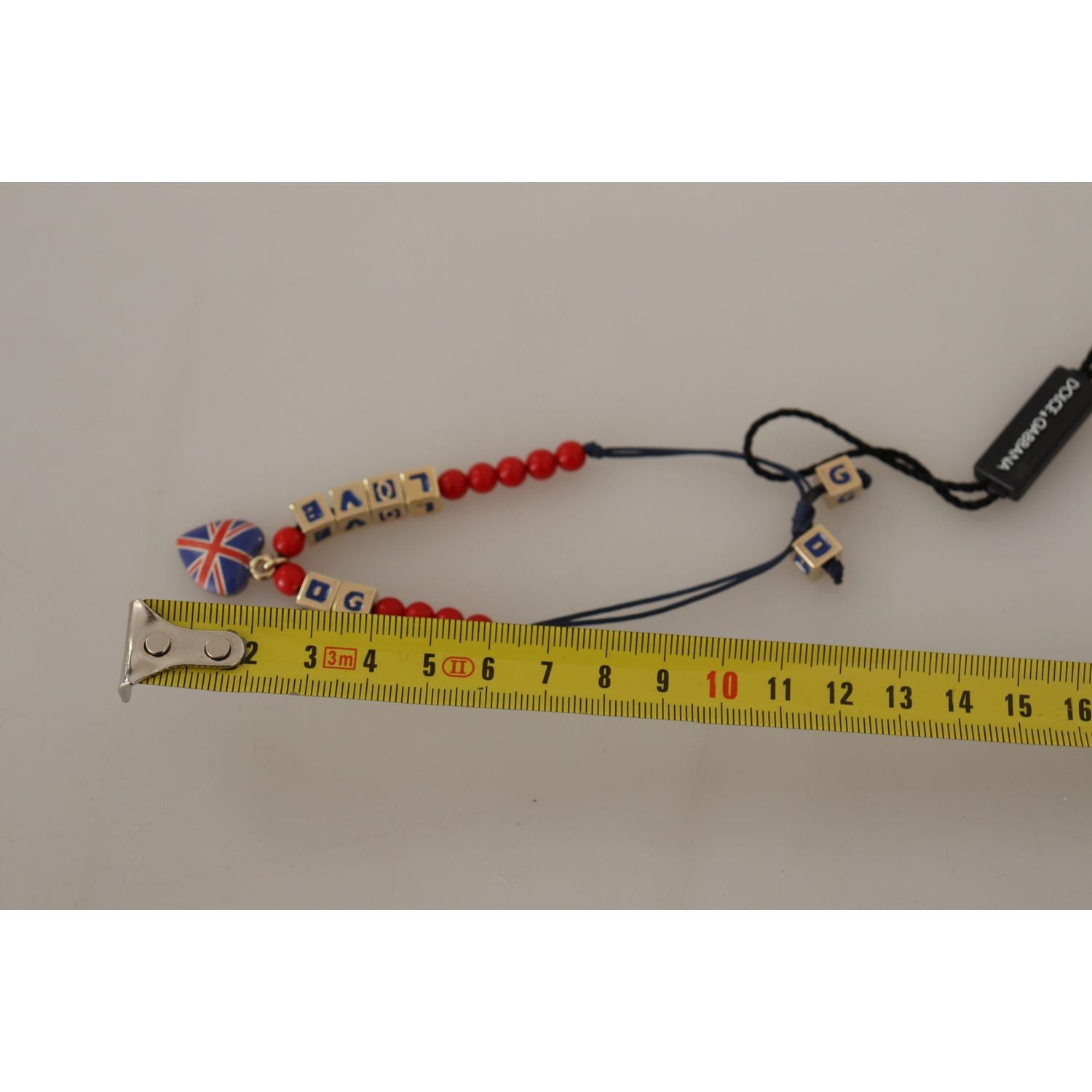 سوار دولتشي آند غابانا الأنيق المصنوع من الزجاج الأزرق والأحمر وزاما