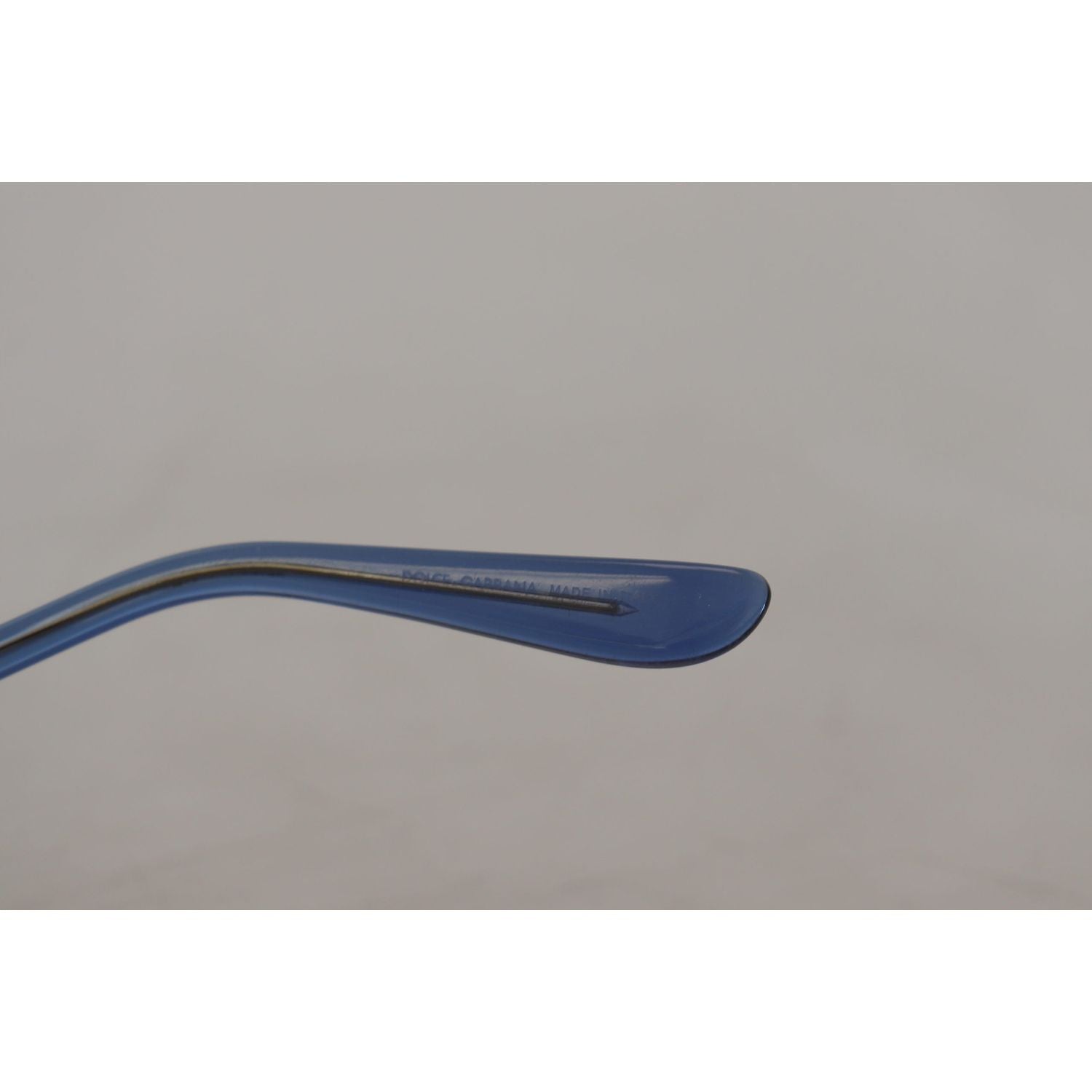 نظارة شمسية دولتشي آند غابانا بيضاوية ذهبية مزينة بالكريستال