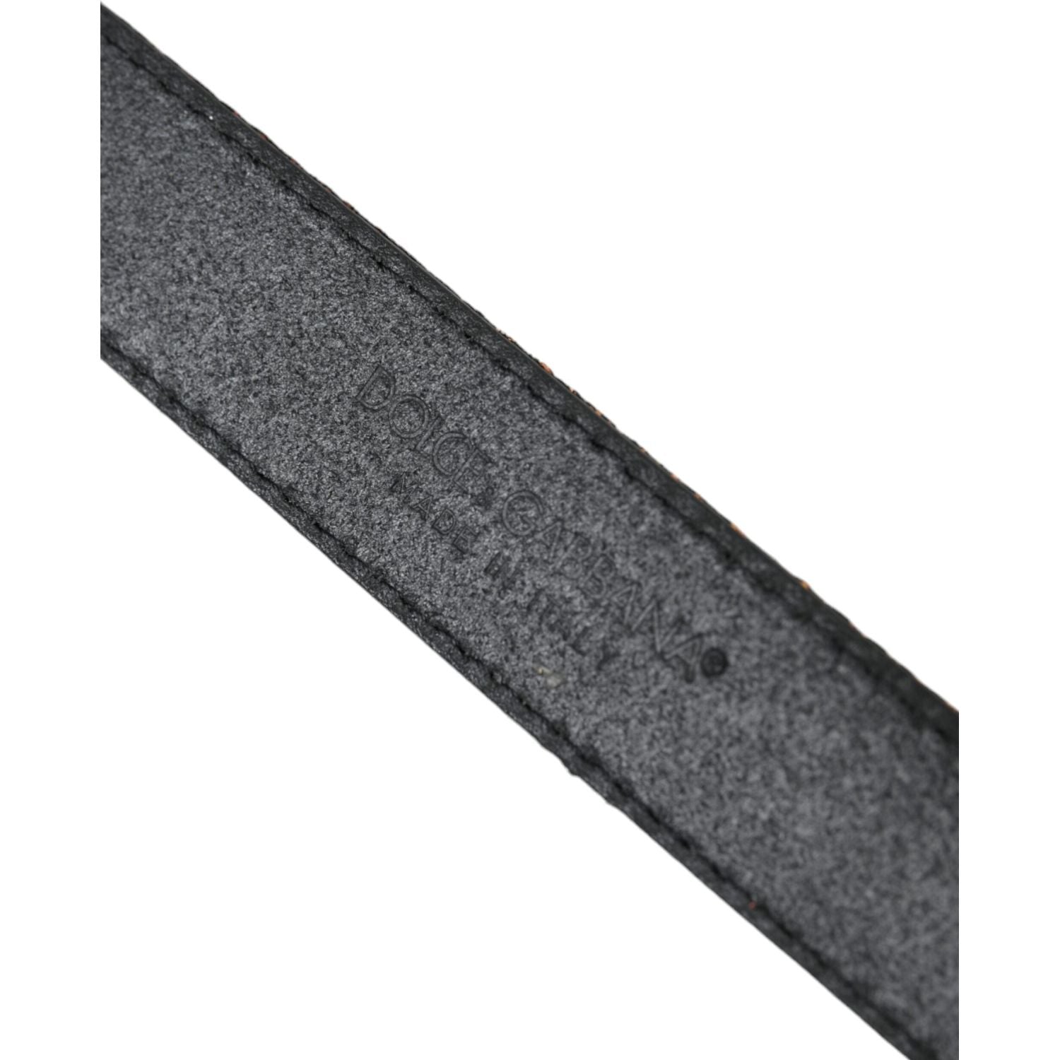 حزام دولتشي آند غابانا الذهبي المخطط بمشبك معدني فضي