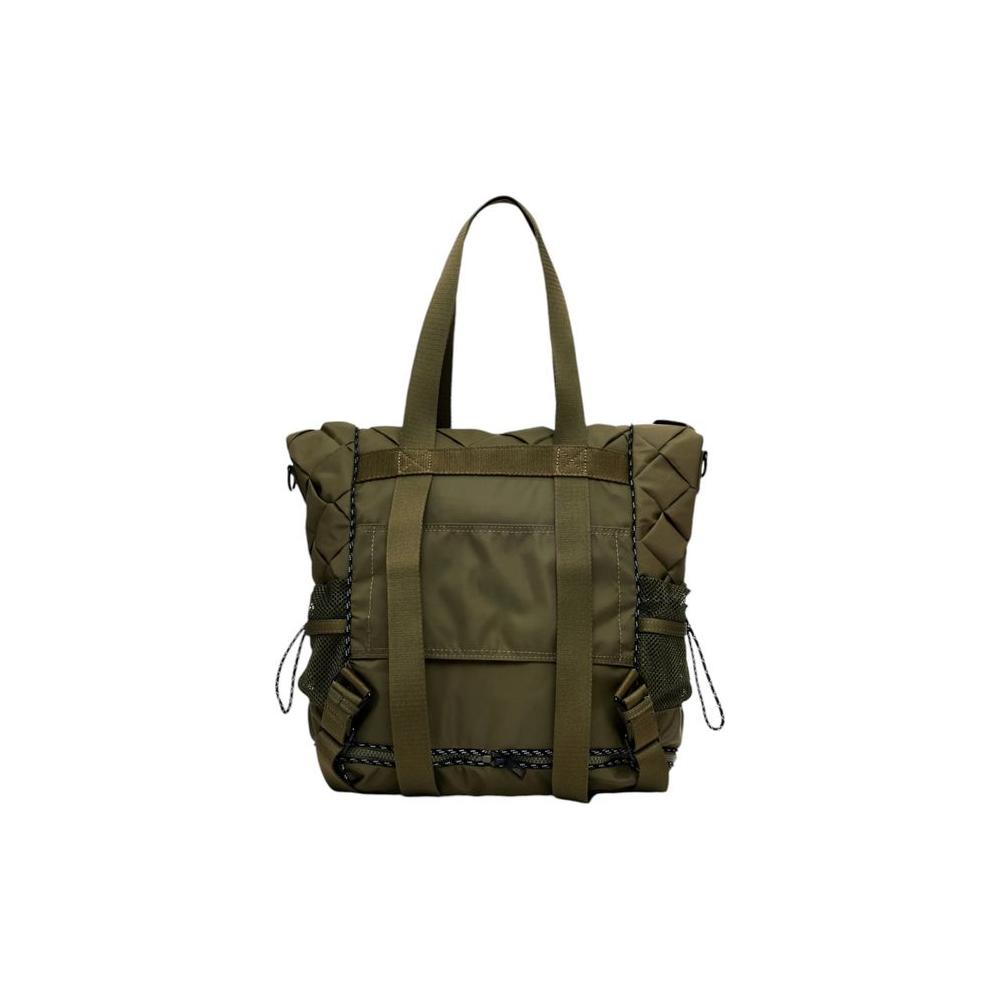 Front view with bag zipped and handles upright.