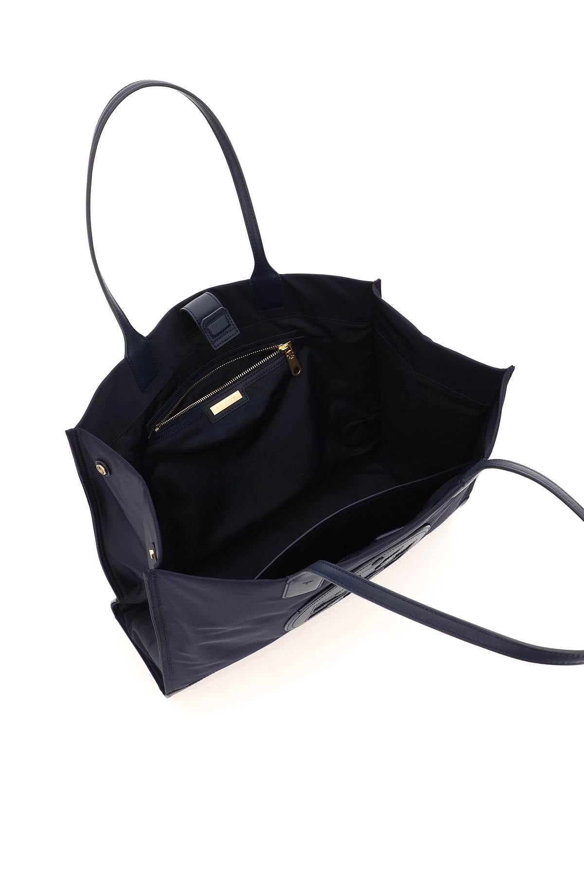 Front view with bag zipped and handles upright.